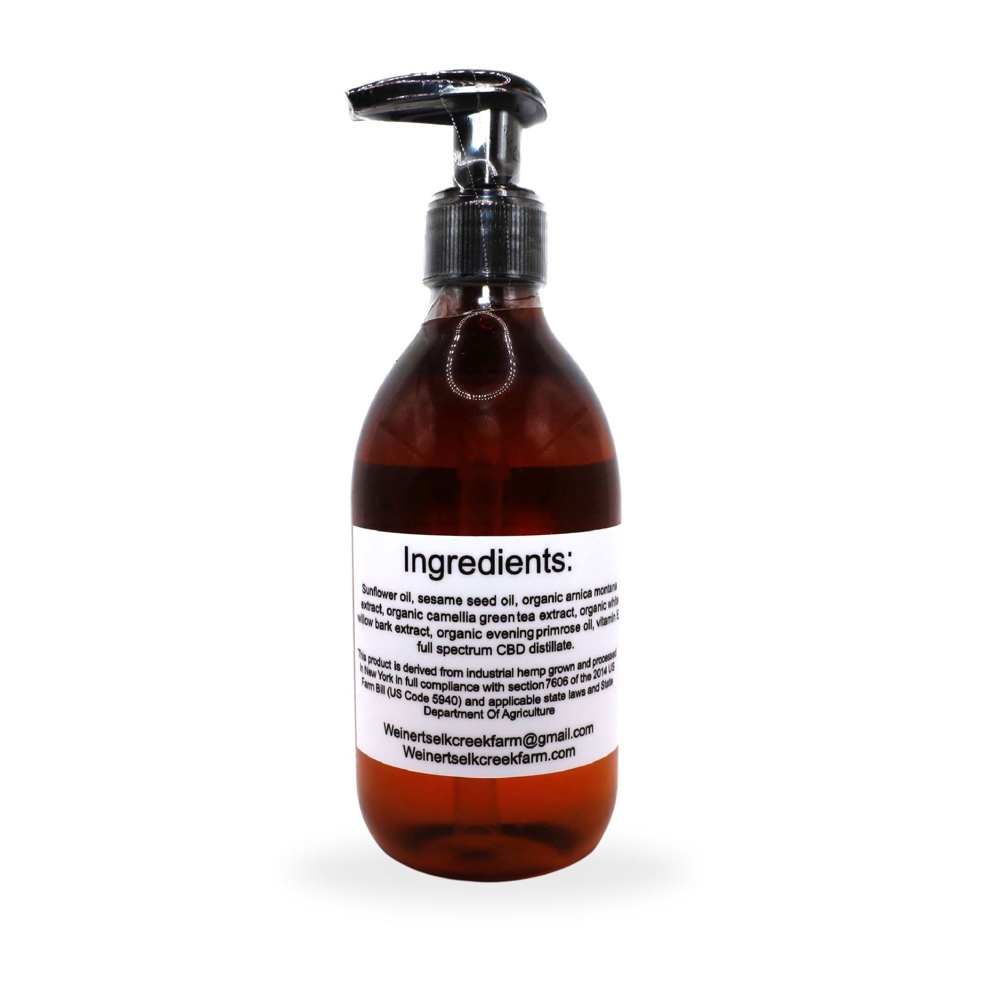 The back of a 1100mg bottle of premium CBD Massage Oil sitting on a white background. This CBD Massage oil is made with sunflower oil, sesame seed oil, full spctrum CBD oil