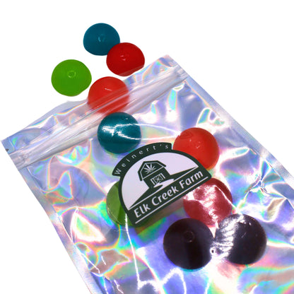 An open package of CBD Hard Candies laying on a white background.