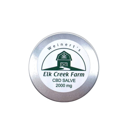 A 2000mg tin of premium CBD Salve from Weinert's Elk Creek Farming sitting on a white background.